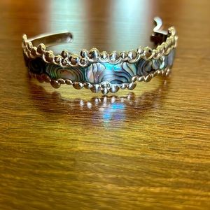 Cuff bracelet with shell design